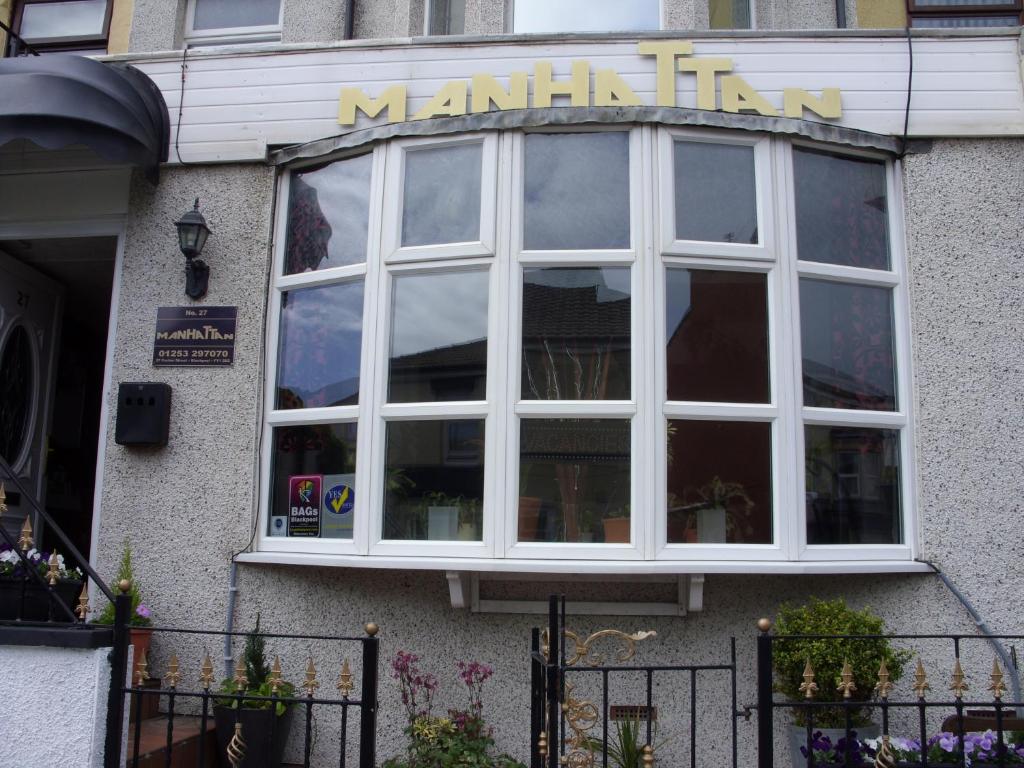 a large window on the front of a mannan inn at The Manhattan in Blackpool