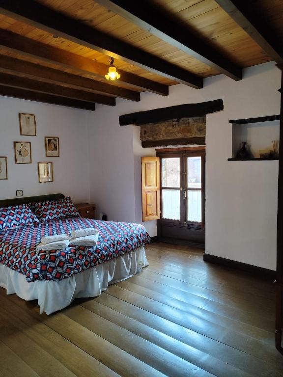 Posteľ alebo postele v izbe v ubytovaní Casa Simón