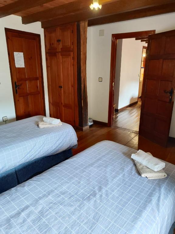 Posteľ alebo postele v izbe v ubytovaní Casa Simón