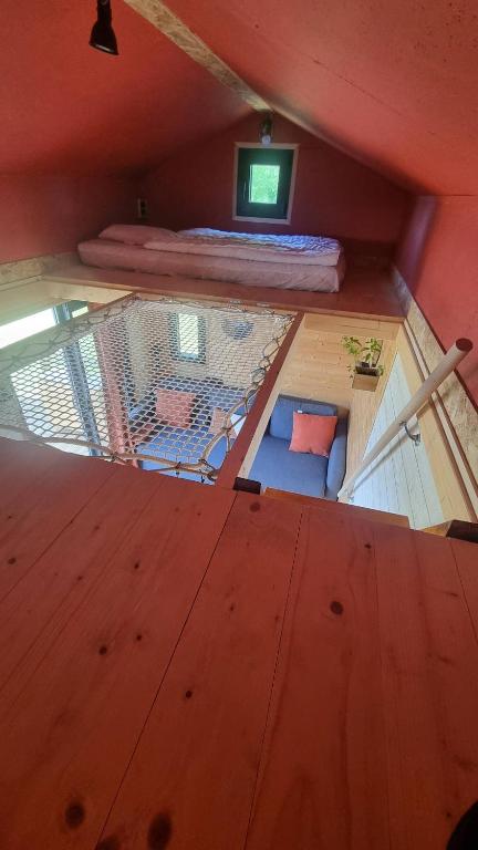 an overhead view of a room in a house at Camping à la ferme - Hébergements insolites in Cerisy-la-Forêt