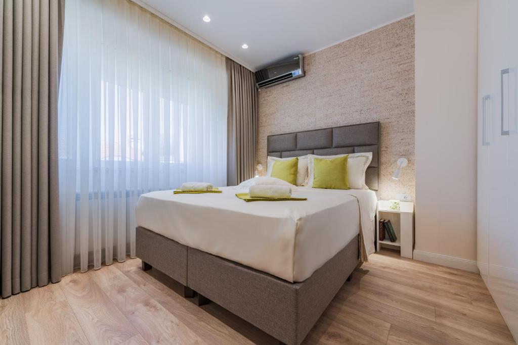 Postel nebo postele na pokoji v ubytování Luxury Seaside Apartment