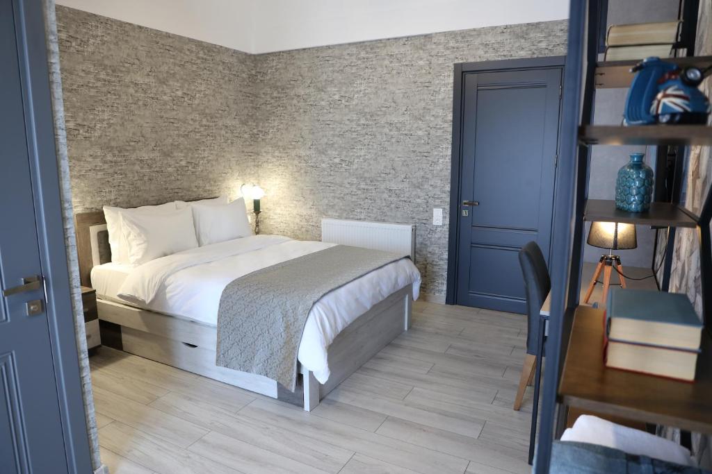 Postel nebo postele na pokoji v ubytování Hotel Saguramo Bliss