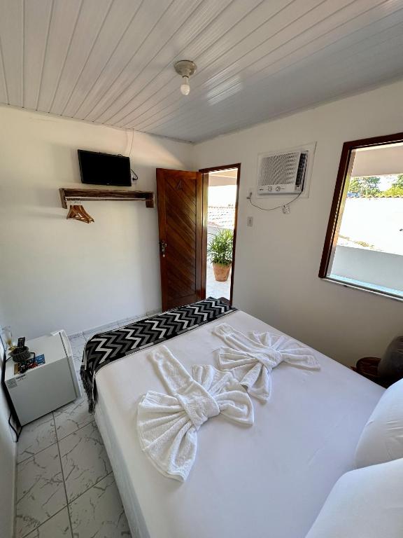 Postel nebo postele na pokoji v ubytování Mar à Vista Ilha de Boipeba