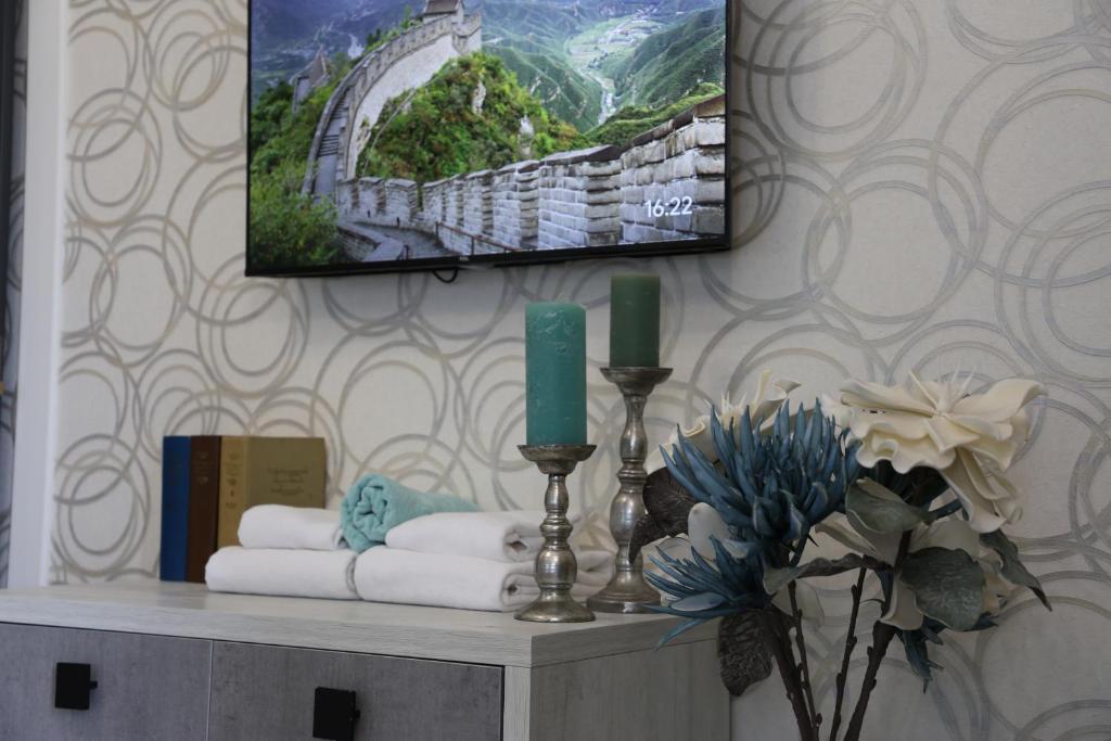 TV a/nebo společenská místnost v ubytování Hotel Saguramo Bliss