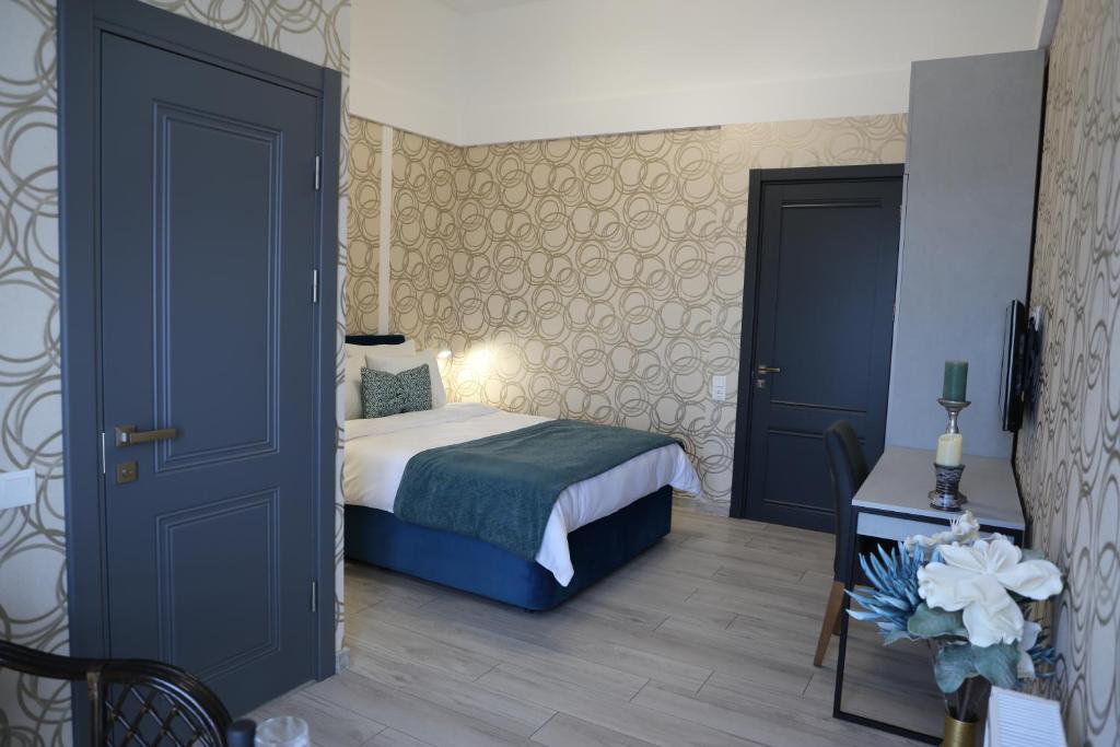 Postel nebo postele na pokoji v ubytování Hotel Saguramo Bliss
