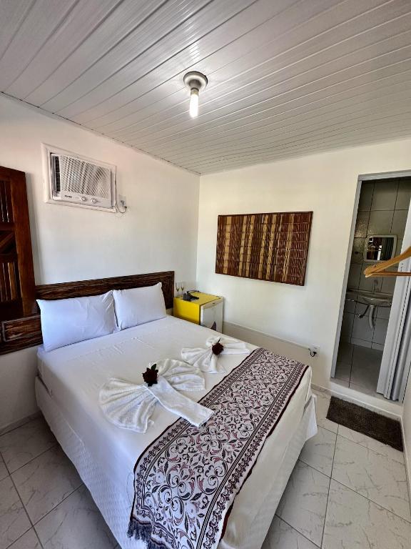 Postel nebo postele na pokoji v ubytování Mar à Vista Ilha de Boipeba