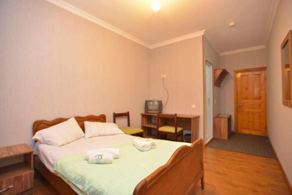 Voodi või voodid majutusasutuse Hotel Nikea Paradiso toas