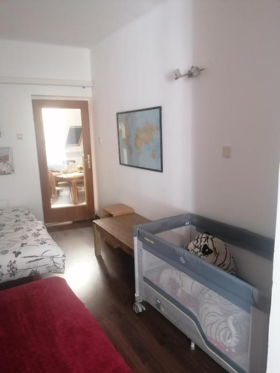 Łóżko lub łóżka w pokoju w obiekcie Újkapu Sunshine Apartments