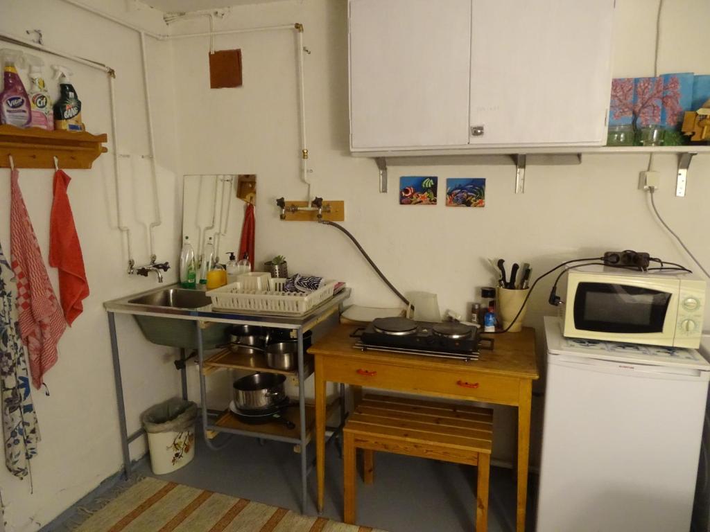 Kuchyň nebo kuchyňský kout v ubytování Guesthouse Simolle