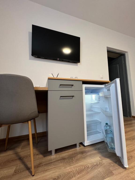 TV a/nebo společenská místnost v ubytování Salin Home