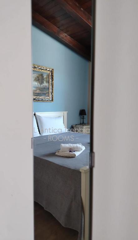 Posteľ alebo postele v izbe v ubytovaní L' Antica Trebbia - Rooms
