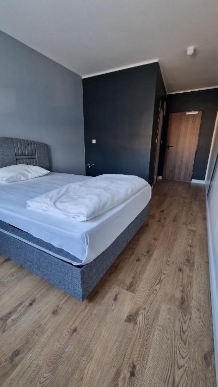 Postel nebo postele na pokoji v ubytování Hotel Delisa