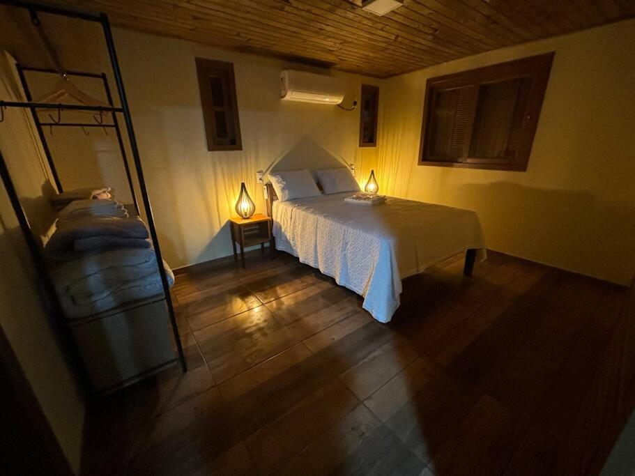 Ένα ή περισσότερα κρεβάτια σε δωμάτιο στο Casa Malacara nos Canyons