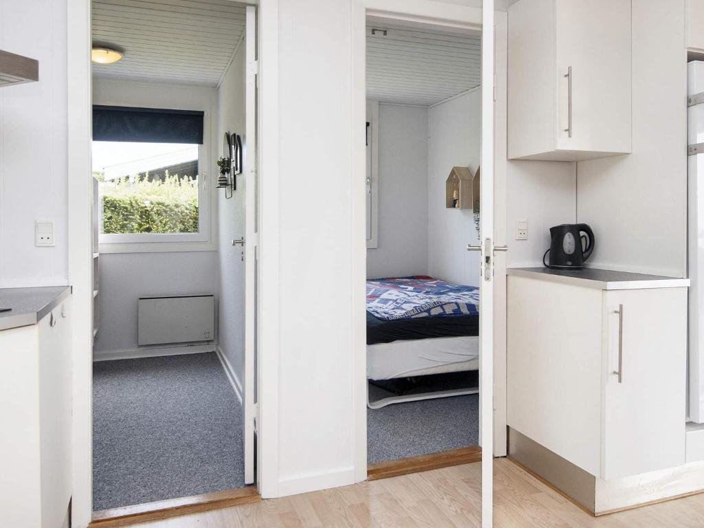 Kuchyň nebo kuchyňský kout v ubytování Holiday home Aabenraa LXXV