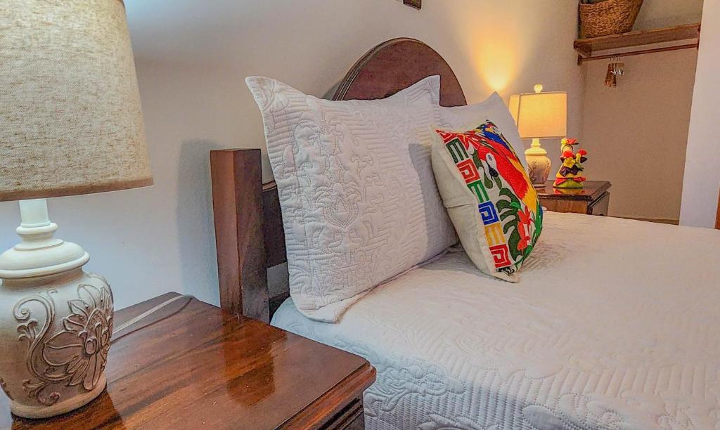 Postel nebo postele na pokoji v ubytování Hotel Itzae
