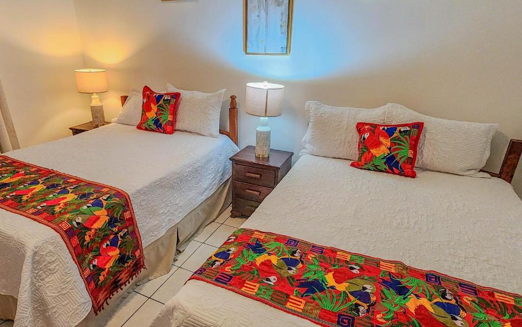 Postel nebo postele na pokoji v ubytování Hotel Itzae