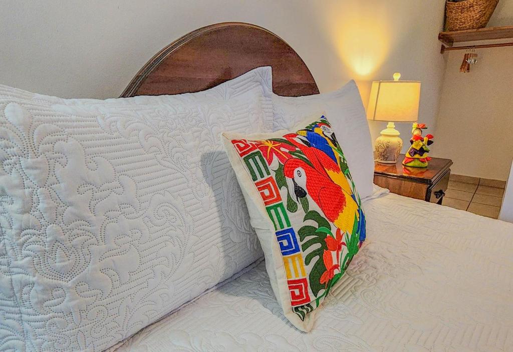 Postel nebo postele na pokoji v ubytování Hotel Itzae
