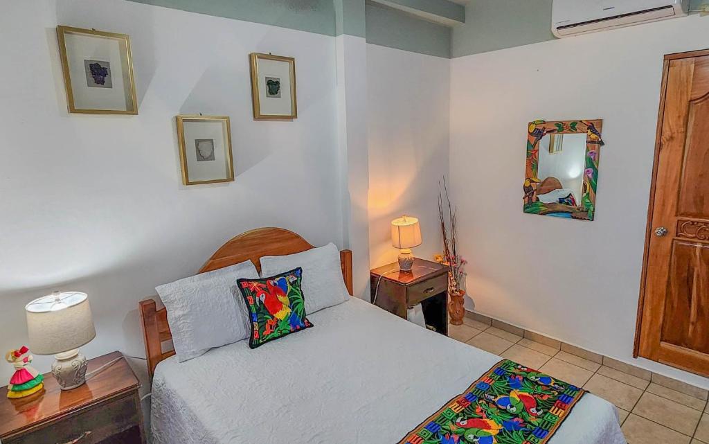 Postel nebo postele na pokoji v ubytování Hotel Itzae