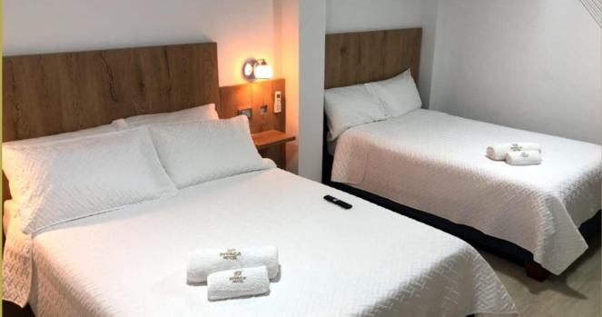 Postel nebo postele na pokoji v ubytování Hotel Divaca