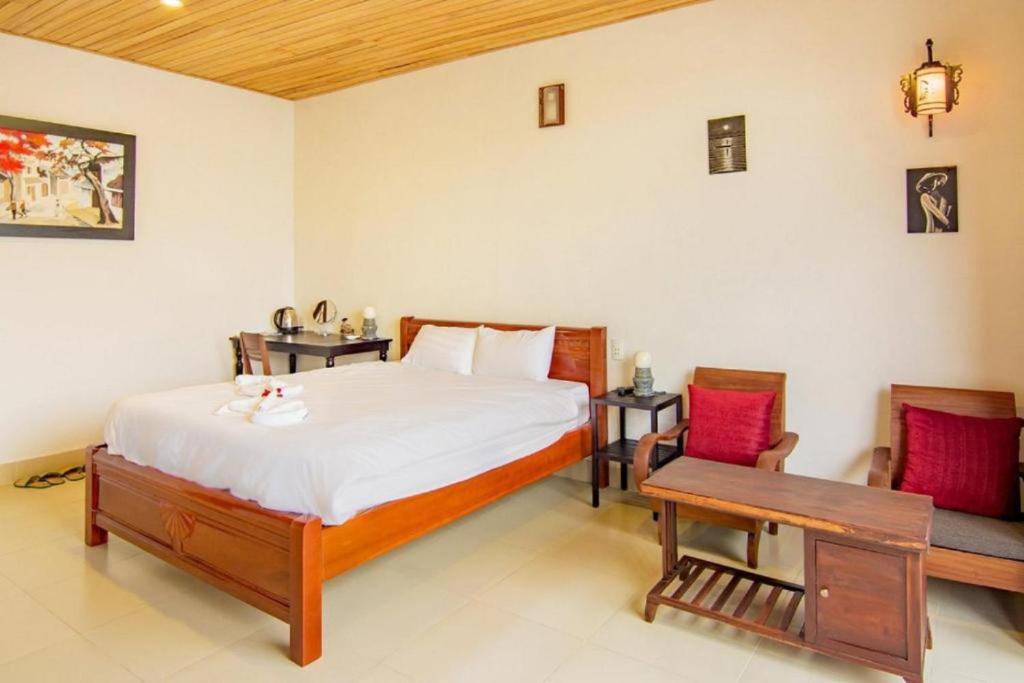 Postel nebo postele na pokoji v ubytování Homestay Ocbien