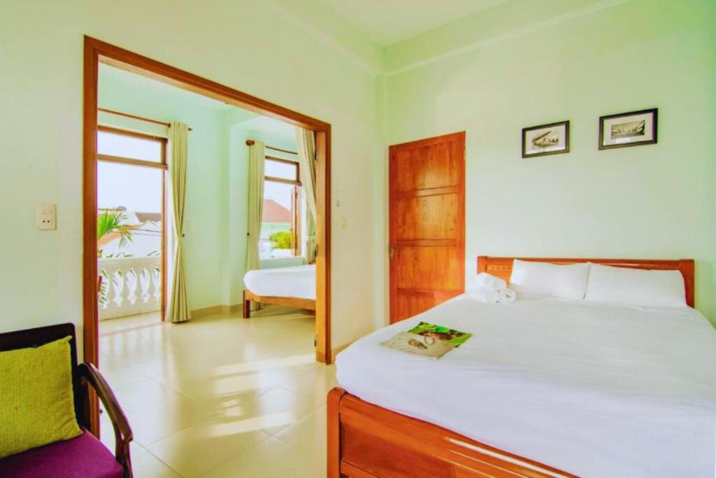 Postel nebo postele na pokoji v ubytování Homestay Ocbien