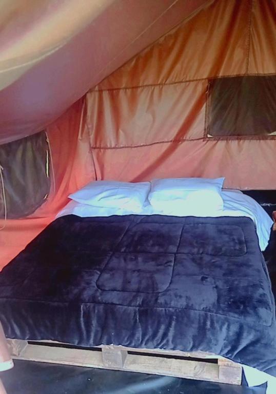 Postel nebo postele na pokoji v ubytování Hospedaje Guatavita cabaña tippie