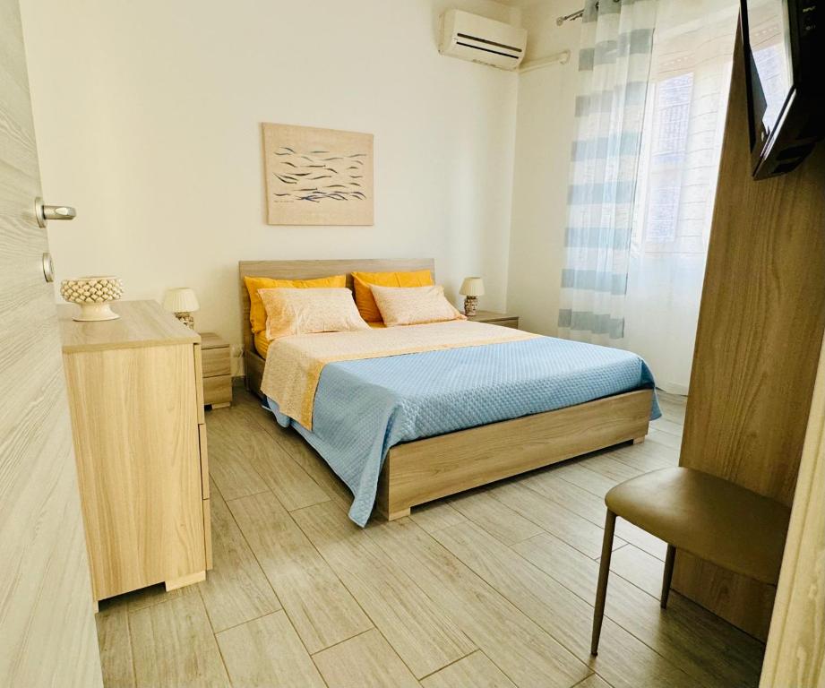 Posteľ alebo postele v izbe v ubytovaní Casa Gio - Appartamenti Vacanze