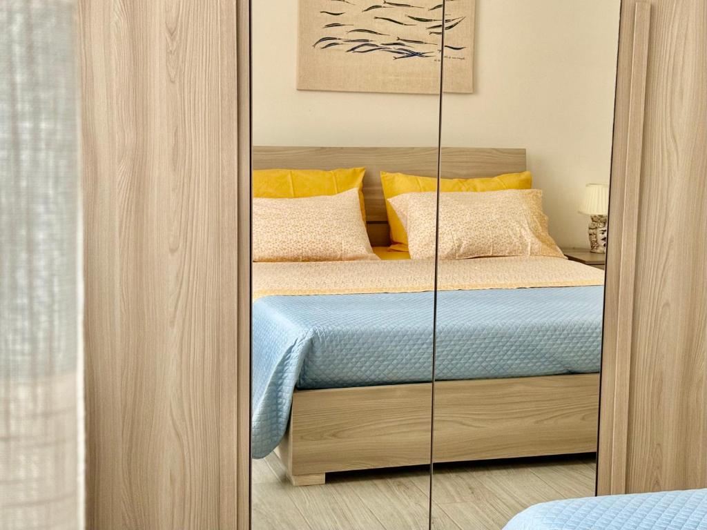 Posteľ alebo postele v izbe v ubytovaní Casa Gio - Appartamenti Vacanze