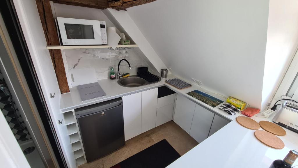 Appartement Cœur de Paris avec vue sur les toits - 18