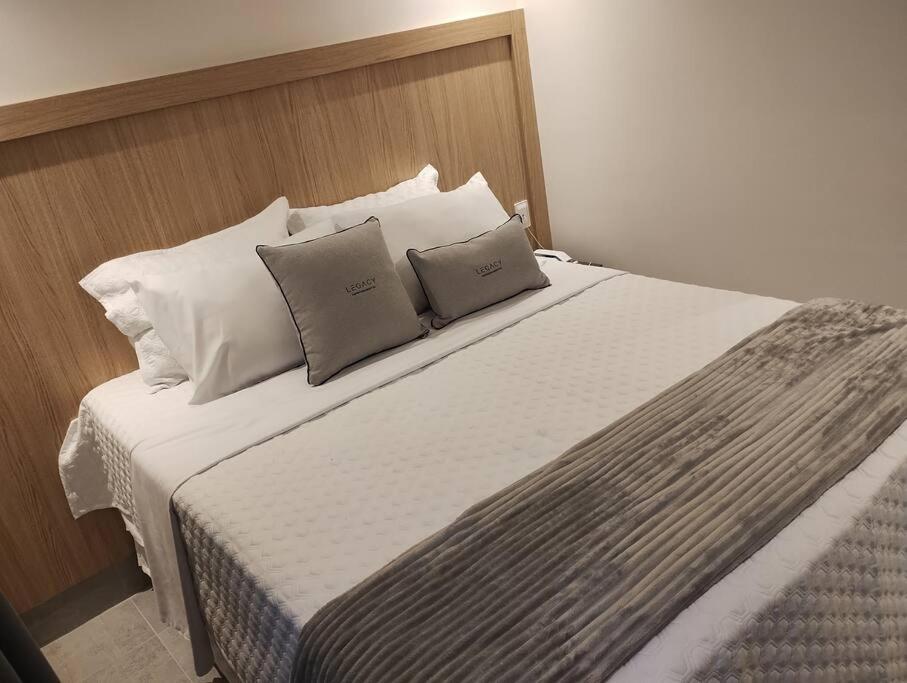 Postel nebo postele na pokoji v ubytování Apto 203 Legacy Suítes