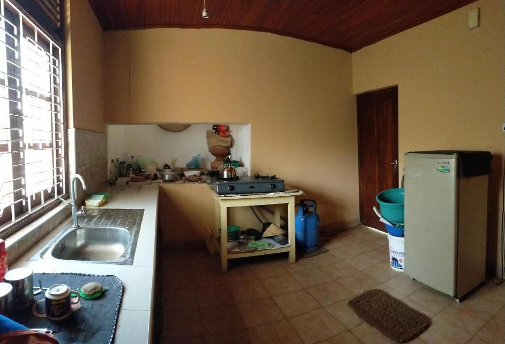 Kuchyň nebo kuchyňský kout v ubytování Shady Homestay