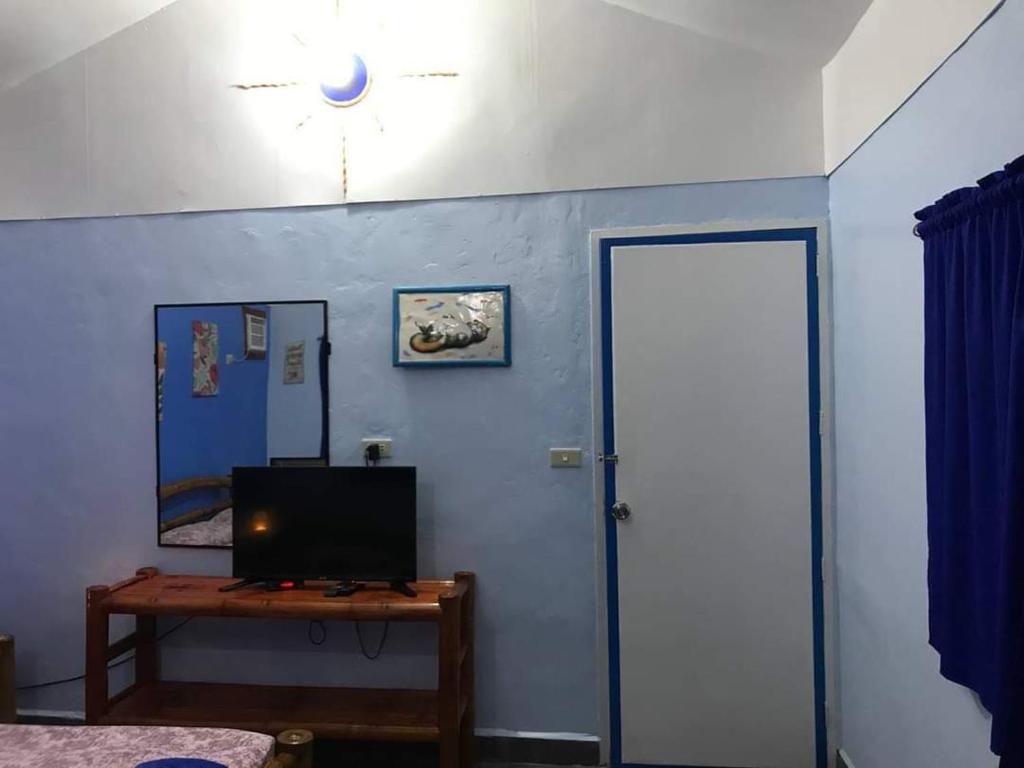 TV a/nebo společenská místnost v ubytování Sun House Rental