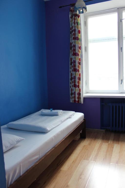 Postel nebo postele na pokoji v ubytování Viru Backpackers Hostel