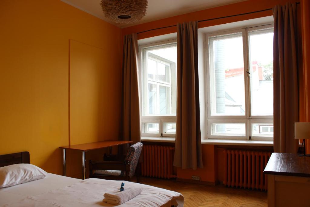 Postel nebo postele na pokoji v ubytování Viru Backpackers Hostel
