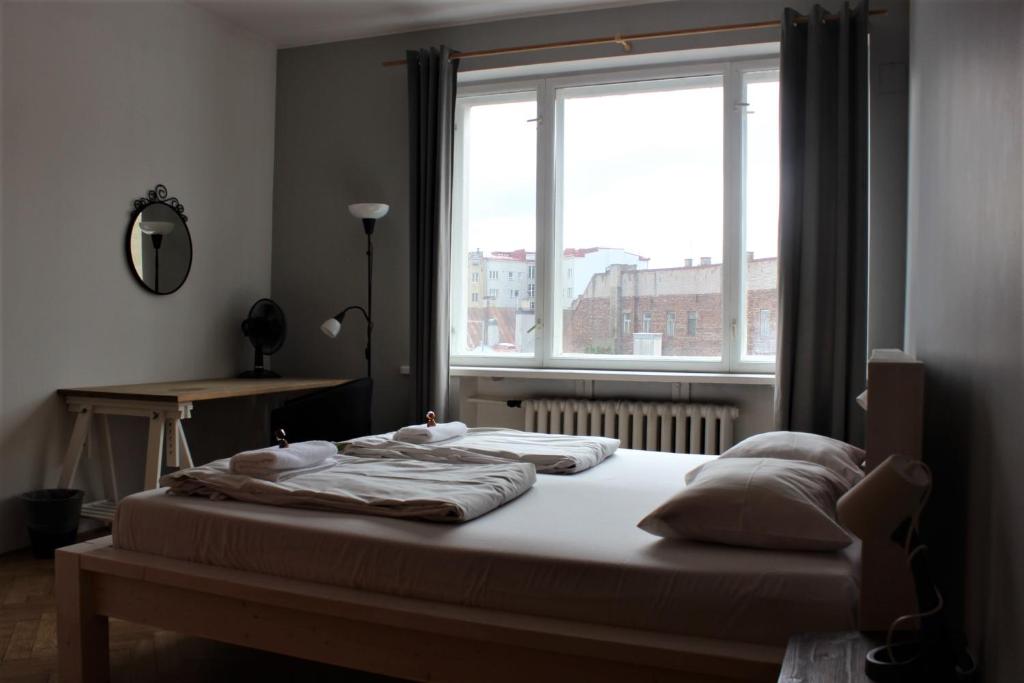 Postel nebo postele na pokoji v ubytování Viru Backpackers Hostel