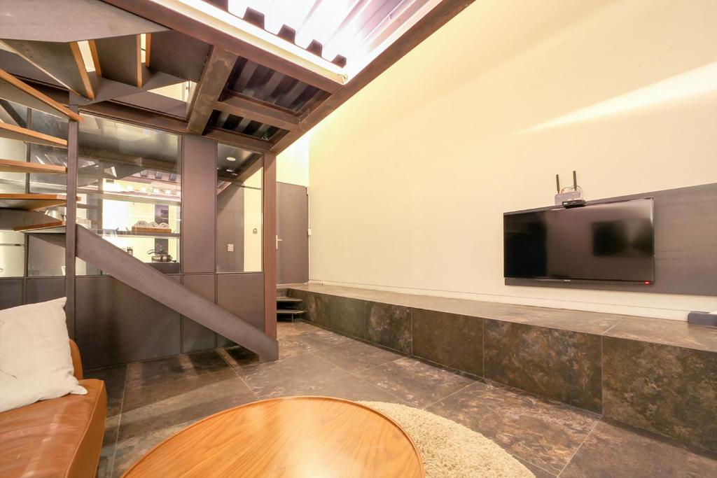 TV a/nebo společenská místnost v ubytování JS Boutique Hotel