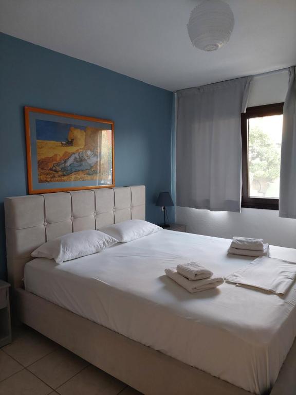 Posteľ alebo postele v izbe v ubytovaní Dora's House comfortable apartment with a yard and view