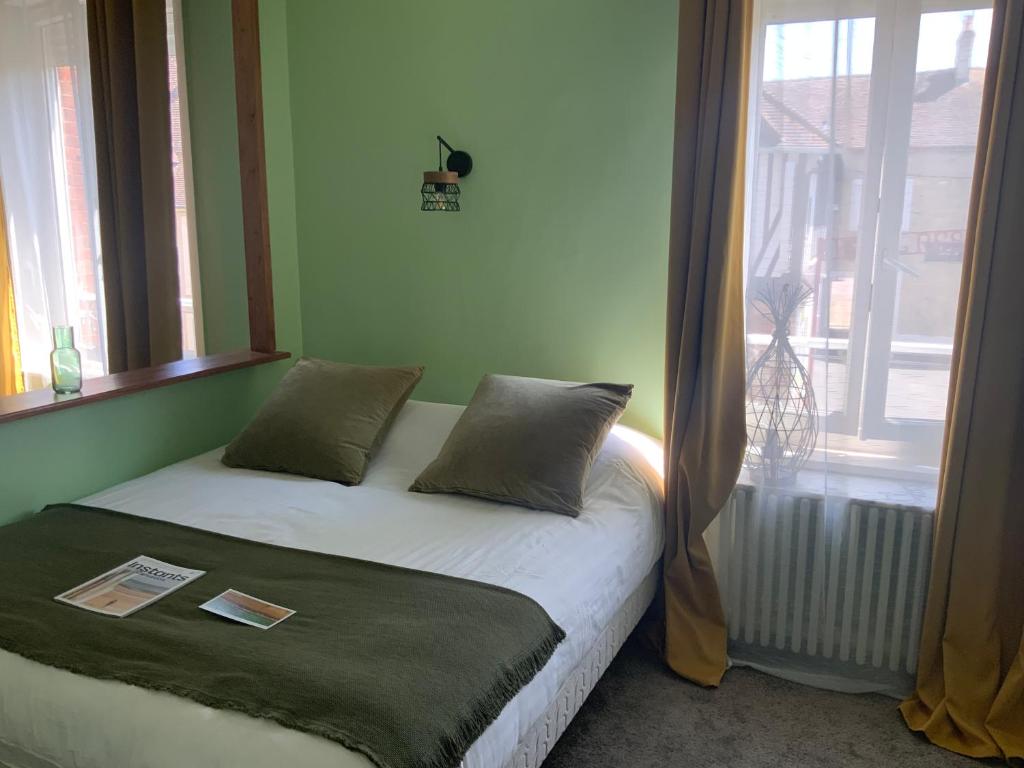 Postel nebo postele na pokoji v ubytování Par la Dives