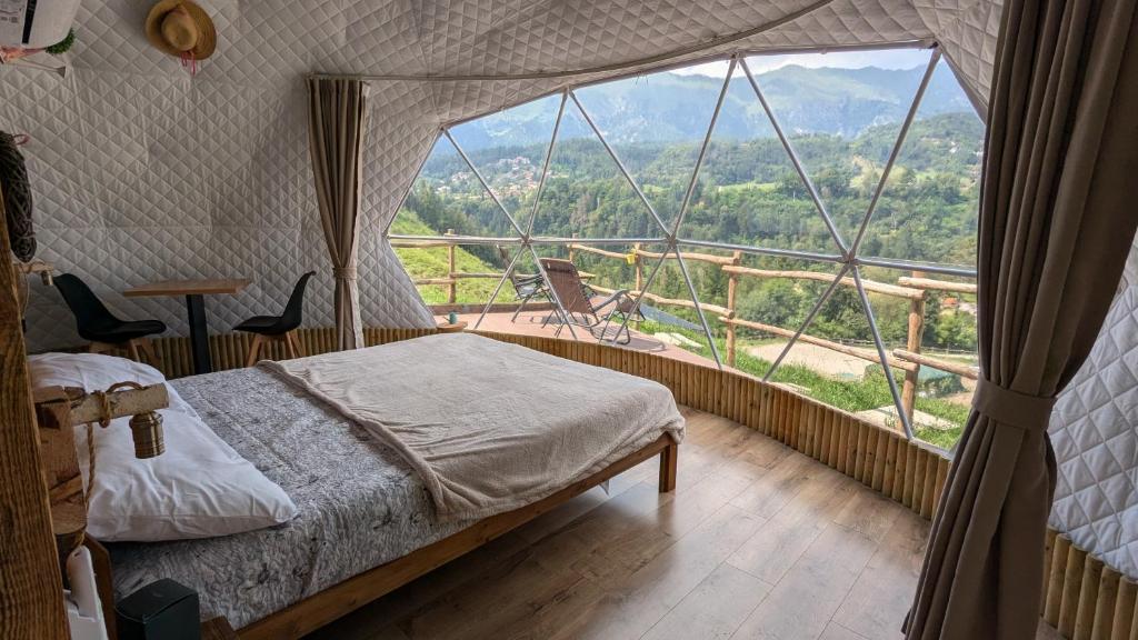 Postel nebo postele na pokoji v ubytování EdenCamp glamping