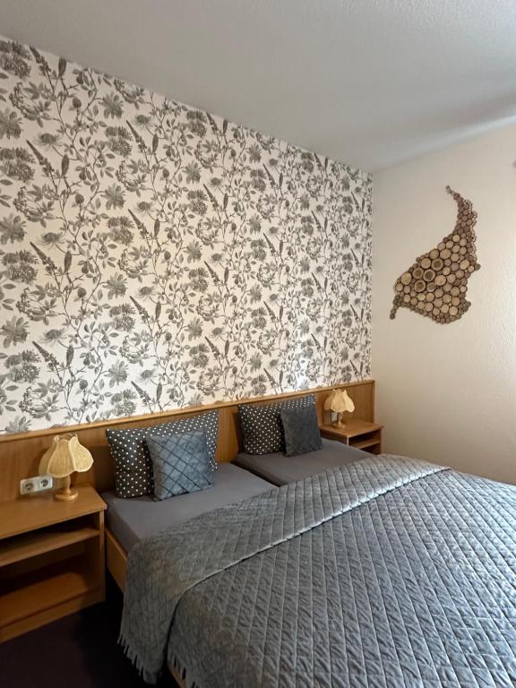 Postel nebo postele na pokoji v ubytování Pension und Monteurzimmer mit Küche und Waschmaschine