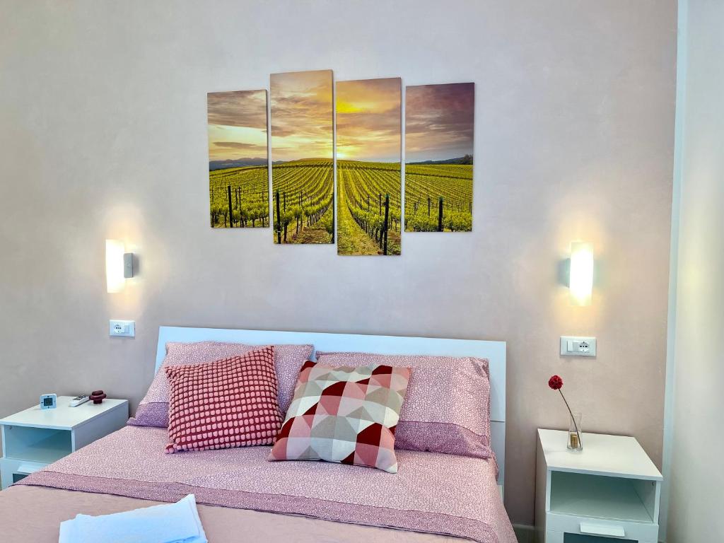 Postel nebo postele na pokoji v ubytování Il Vigneto Suite