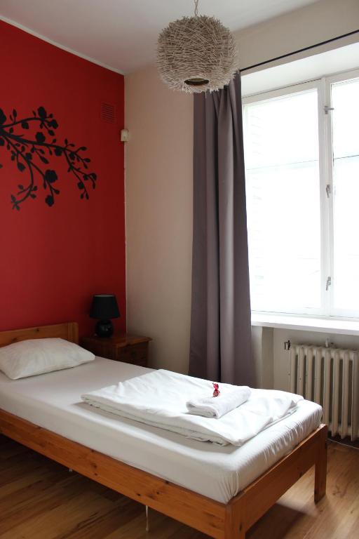 Postel nebo postele na pokoji v ubytování Viru Backpackers Hostel