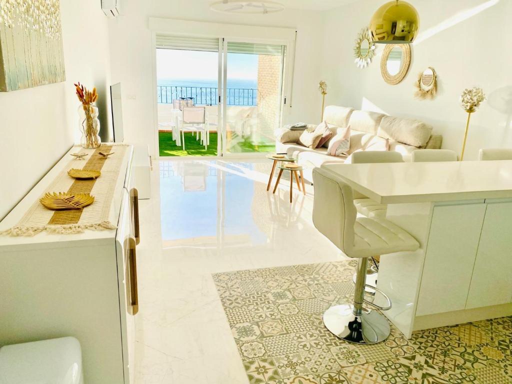 Φωτογραφία από το άλμπουμ του Jardines de Adnania en Marina del Este con vistas al mar σε La Herradura