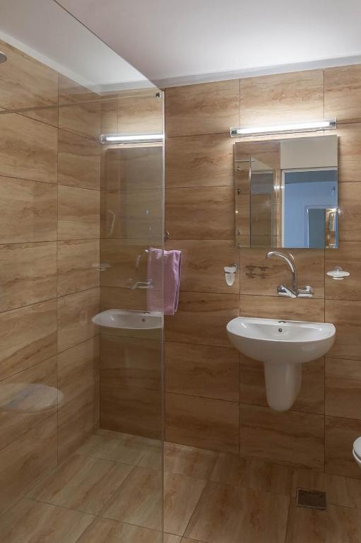 Koupelna v ubytování Hotel Doina