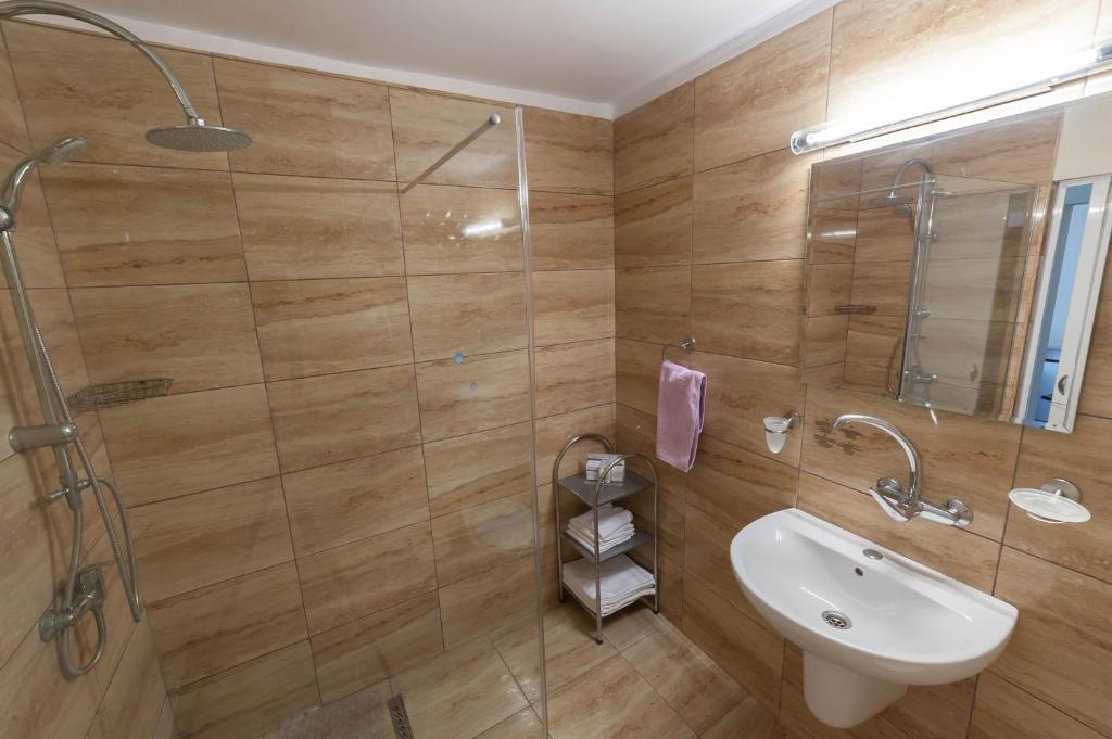Koupelna v ubytování Hotel Doina