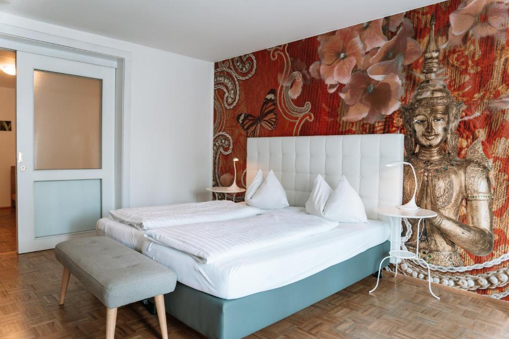 Postel nebo postele na pokoji v ubytování Hotel Restaurant Römerhof