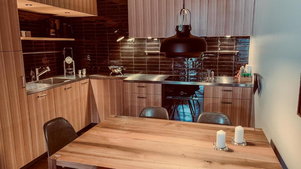 Kuchyň nebo kuchyňský kout v ubytování Ari Resort Apartments