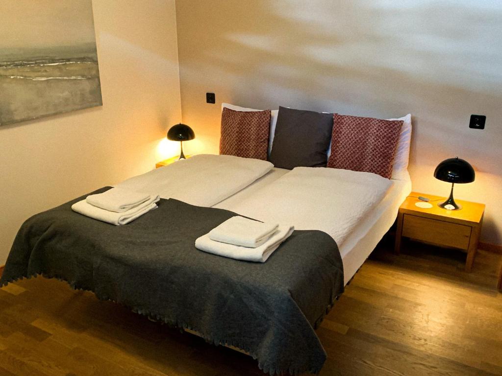 Postel nebo postele na pokoji v ubytování Ari Resort Apartments