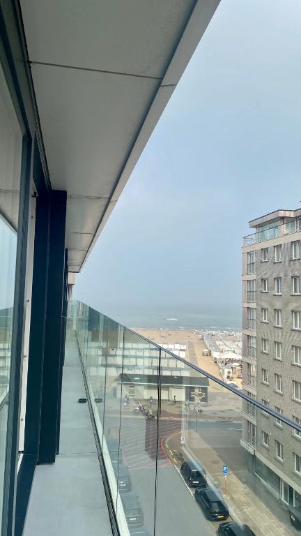 a view of a city street from an office building at Orfeo Knokke in Knokke-Heist