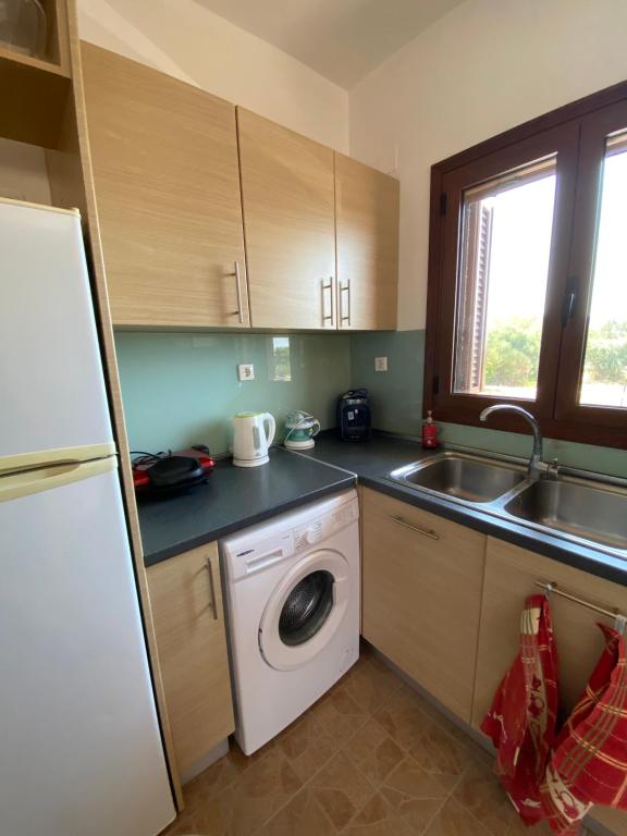 Kuchyň nebo kuchyňský kout v ubytování Apartment kokkines